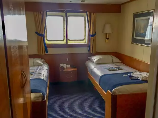 Twin window cabin aboard the small ship Ocean Adventurer. 