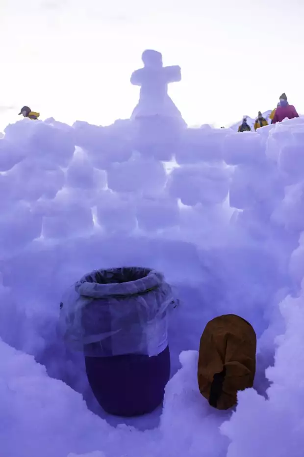 Plastic lined container as a toilet with a wall of snow around it for privacy, used on a camping excursion in Antarctica. 