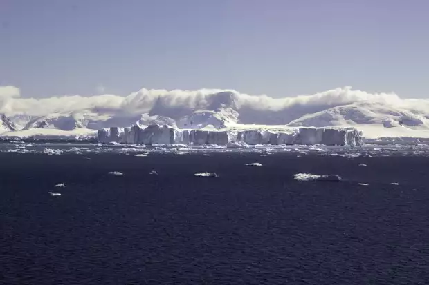 Icebergs seen from a small ship cruise approaching Antarctica. 
