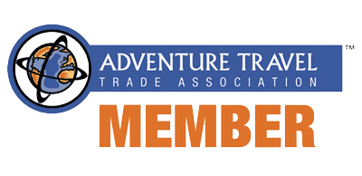 Adventure Travel Trade Association Member logo with globe on axis graphic