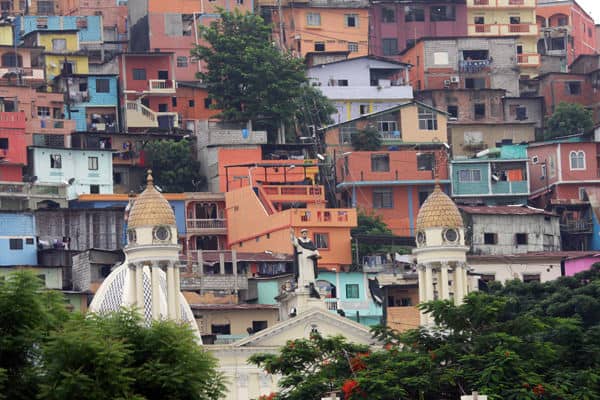 Colorful buildings with a cathedral in the center in Guayaquil.