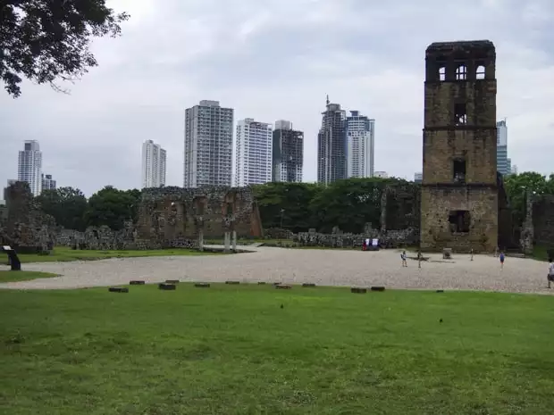 Ruins in old town Panama with the modern city skyline behind. 
