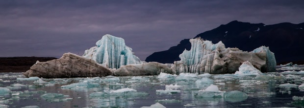 Arctic sea ice at night with a purple sky