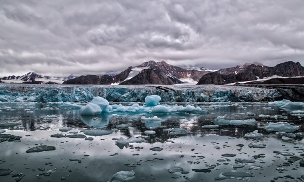 Arctic sea ice with land in the background