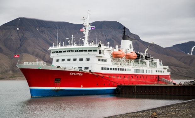 A small ship at dock in the Arctic