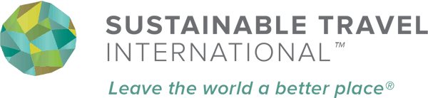 Sustainable Travel International logo with abstract earth globe graphic and Leave the world a better place motto.