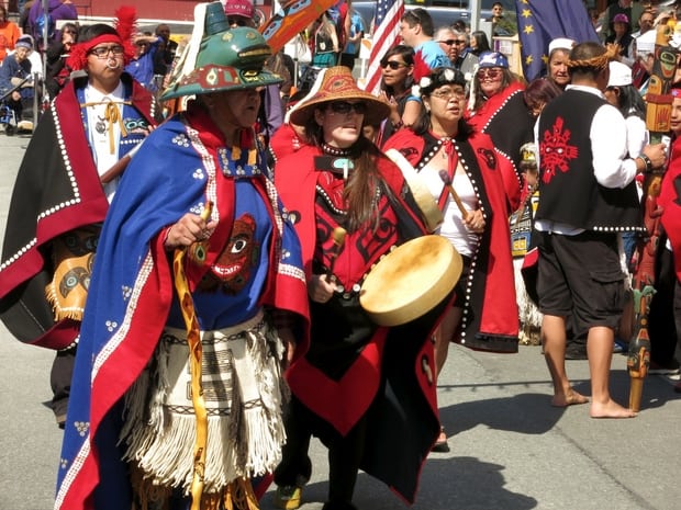 Native tribe in traditional clothes performing in Alaska. 