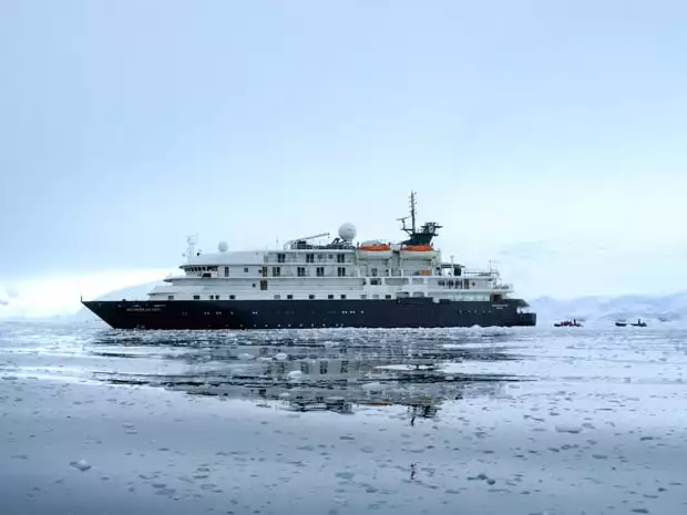 Small expedition ship hebridean Sky in Antarctica. 