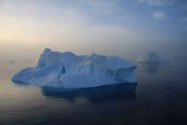 Iceberg seen from a small ship cruise while approaching Antarctica.