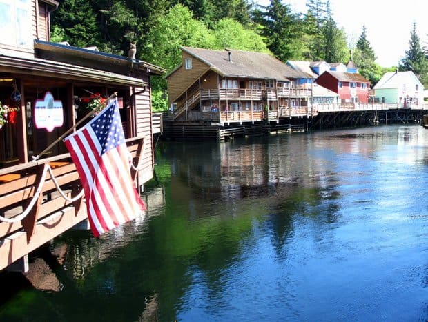 A row of buildings along the waters in Alaska. 