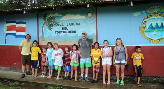 Family from a small ship visiting a local school. 