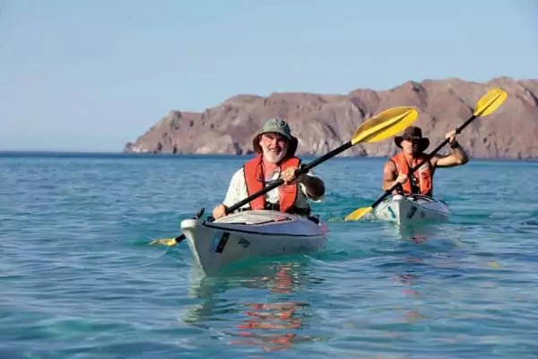 baby boomers kayaking in baja