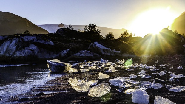 Chunks of glistening ice on a beach in Patagonia. 