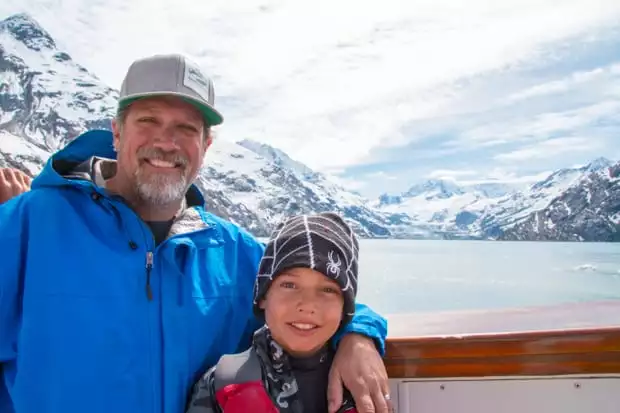 Founder of AdventureSmith Todd Smith and son aboard  Sea Wolf, a small ship cruise in Alaska. 