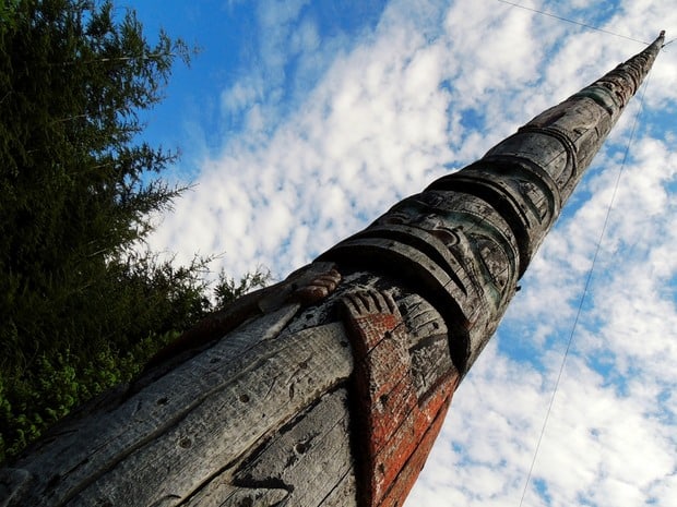 Totem pole seen in port from a small ship Alaskan cruise. 