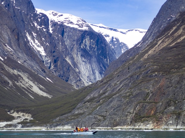 Guests from small ship cruise on a skiff excursion in Endicott Arm, ALaska. 