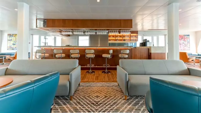 When you need a cocktail or beverage you are in good hands at the lounge bar aboard the Coral Geographer off the coast of Australia