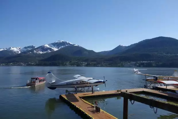 Float plane next to dock in Juneau Alaska. 