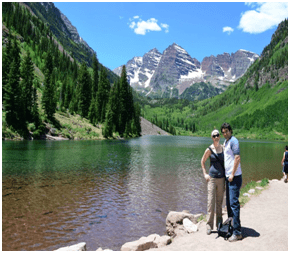 Photo of the Hawaii honeymooners hiking in the mountains at a lake