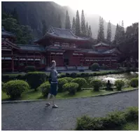 Traveler in front of the Byodo Temple in Hawaii