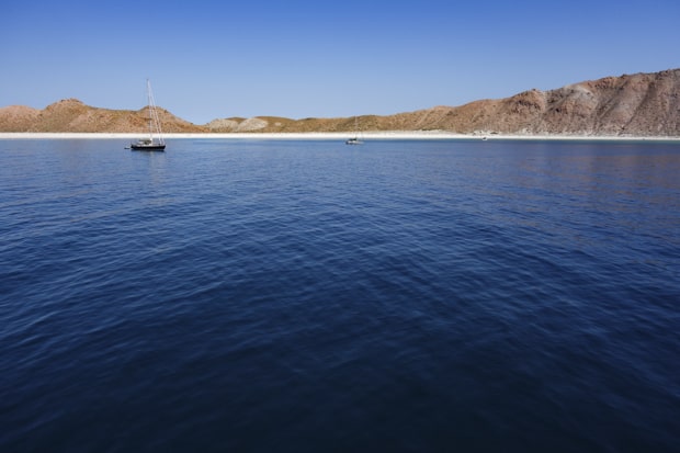 Small ship in calm seas in Baja California. 