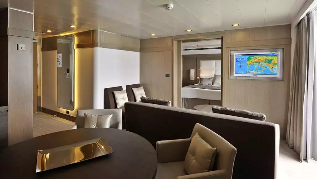 Owner's Suite with king bed aboard L'Austral. Photo by: Francois Lefebvre/Ponant