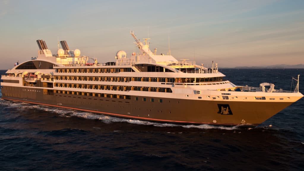 Exterior of expedition ship Le Boreal with 6 passenger decks & gray hull