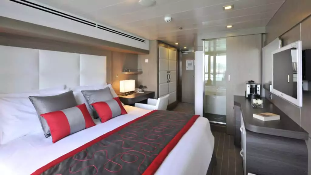 Prestige Stateroom - Decks 4, 5 & 6 with king bed aboard Le Boreal. Photo by: Francois Lefebvre/Ponant