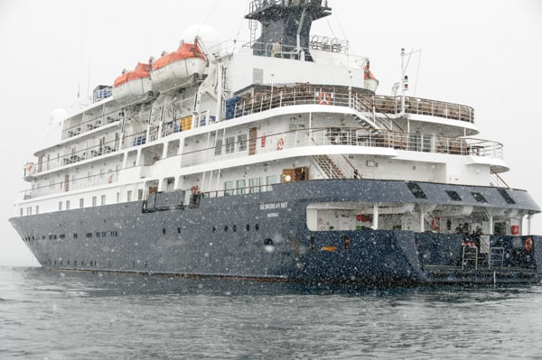 Exterior shot of the whte and blue painted polar expedition vessel the hebridean sky