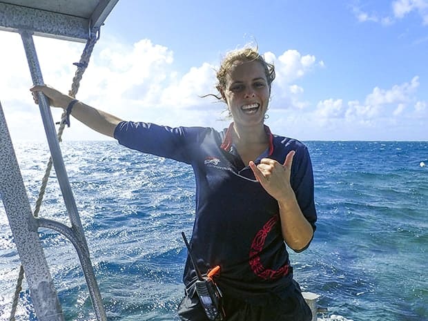 A happy Australian small ship cruise guide on deck