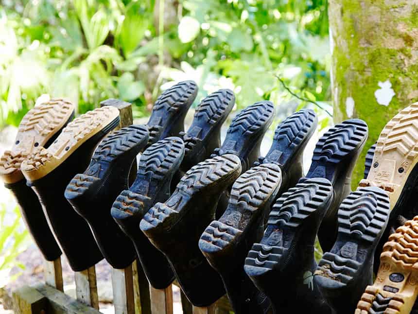 a row ot rubber boots hang to dry at the Lapa Rios Eco Lodge Costa Rica,
