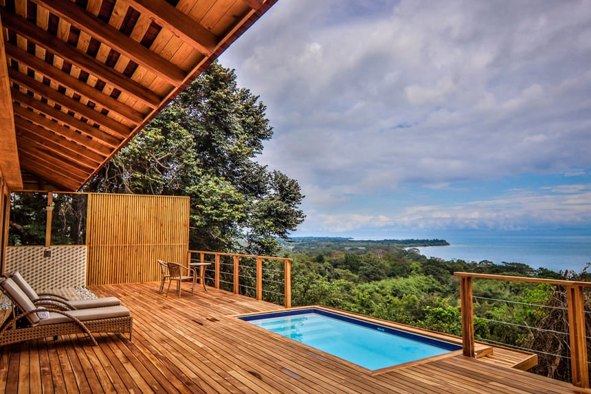 a view over lush jungle and to the ocean from Lapa Rios Eco Lodge Costa Rica