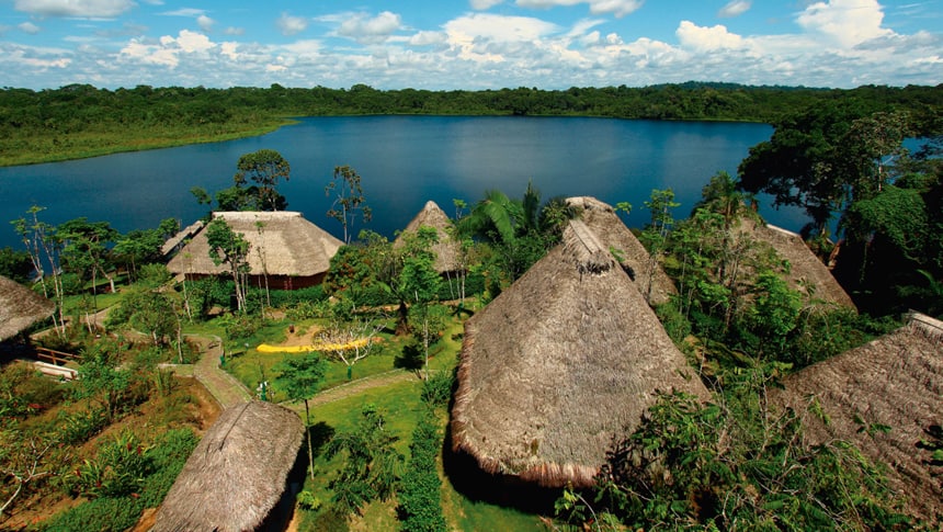 an aerial view from above the cabanas at Napo wilflife center that sit lakefront in the Ecuadorian amazon