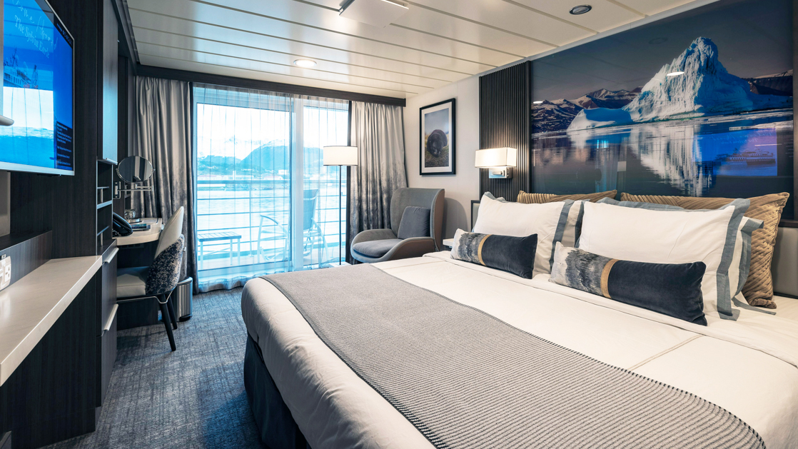 While cruising the polar waters stay warm and comfortable in the Captain Suite aboard the Sylvia Earle with large plush beds