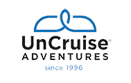 UnCruise Adventures logo of a whale tale.