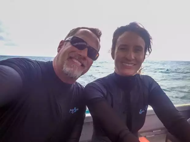 A happy couple aboard a small ship in the Great Barrier reef