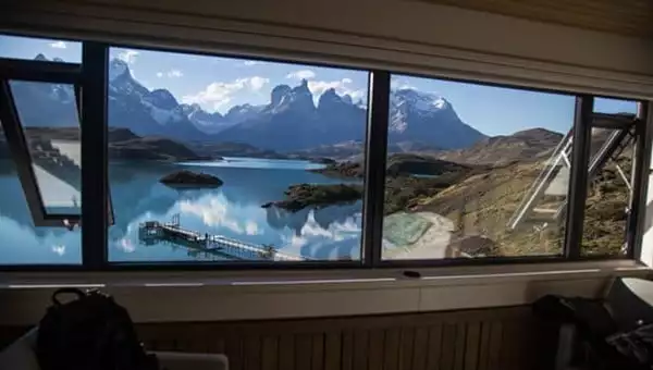 View from Explora Patagonia luxury lodge of Lake Pehoe and the iconic Patagonia mountains.