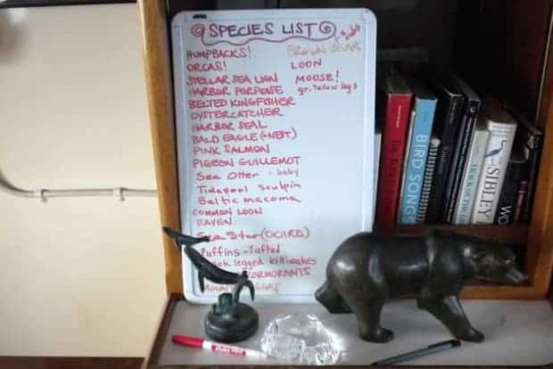 Species list written on a whiteboard on a desk on the small ship cruise boat the Sea Wolf.