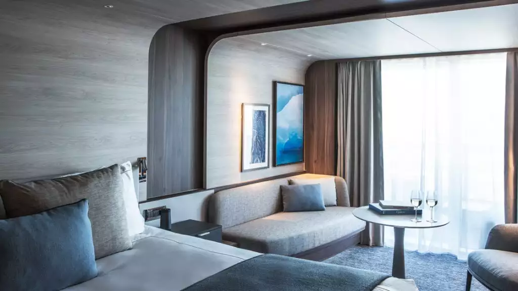 Deluxe Suite with king bed aboard Le Commandant Charcot. Photo by: Gilles Trillard/Ponant