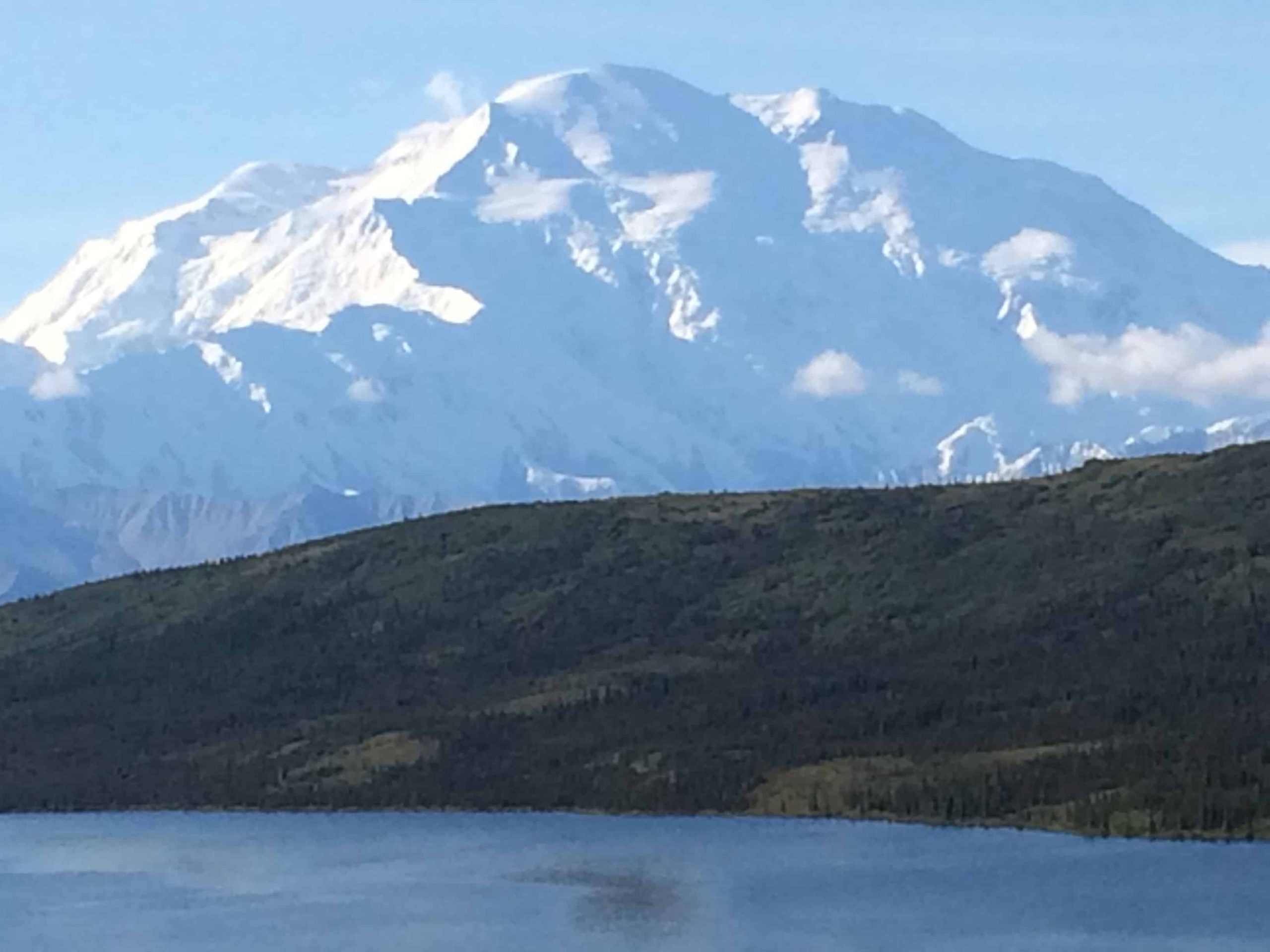 Snow-covered Denali mountain on a beautiful sunny day.
