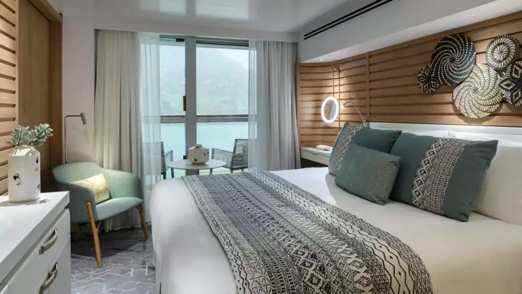 Prestige Suite - Decks 5 & 6 with king bed aboard Le Bellot. Photo by: Francois Lefebvre/Ponant