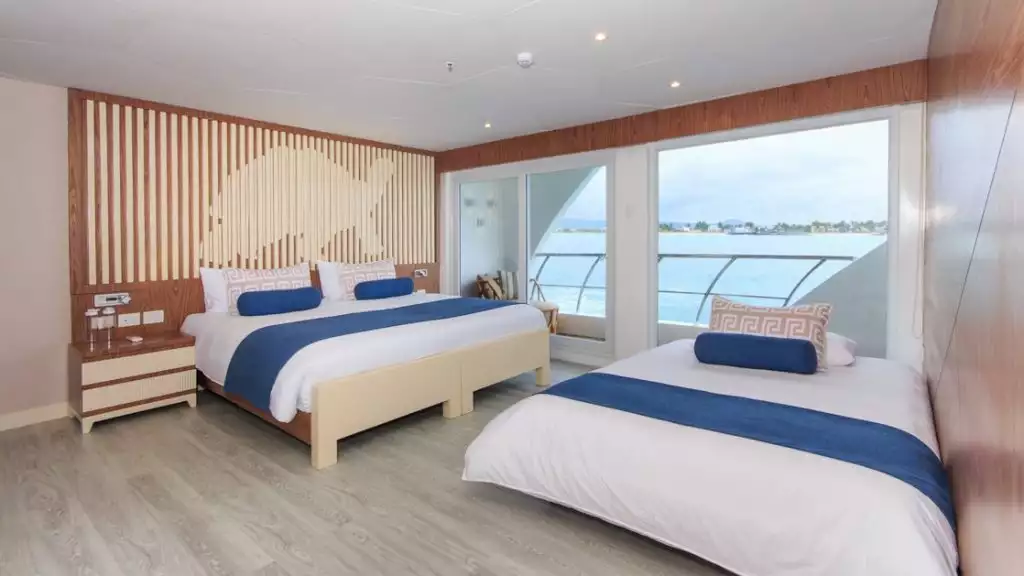 Golden Suite with king-size matrimonial bed and accommodation for a third guest aboard Elite