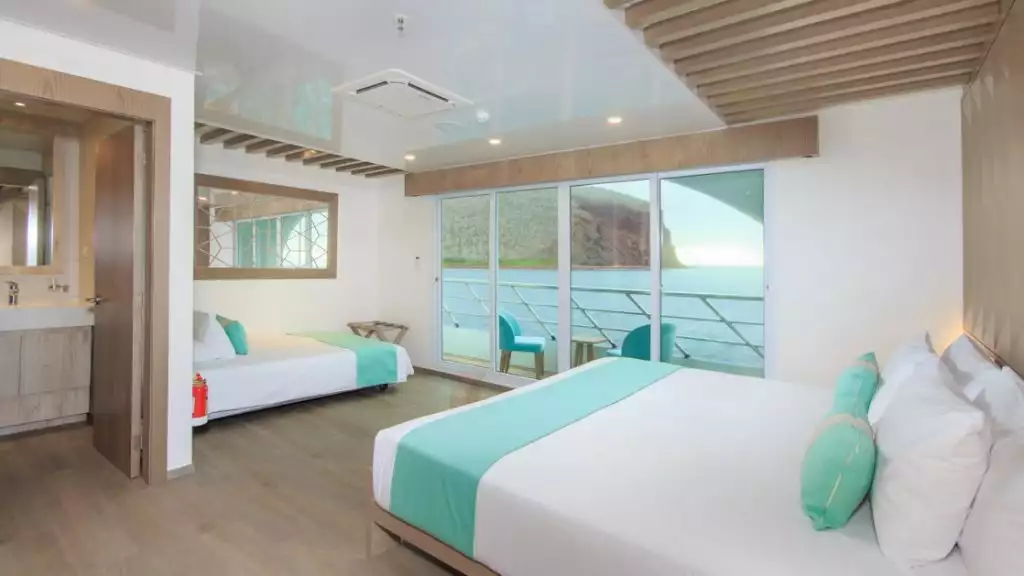 Golden Suite with king-size matrimonial bed and accommodation for a third guest aboard Endemic