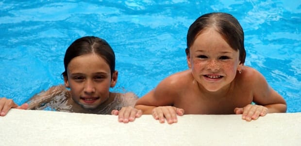 Young travelers enjoying a day at the pool.