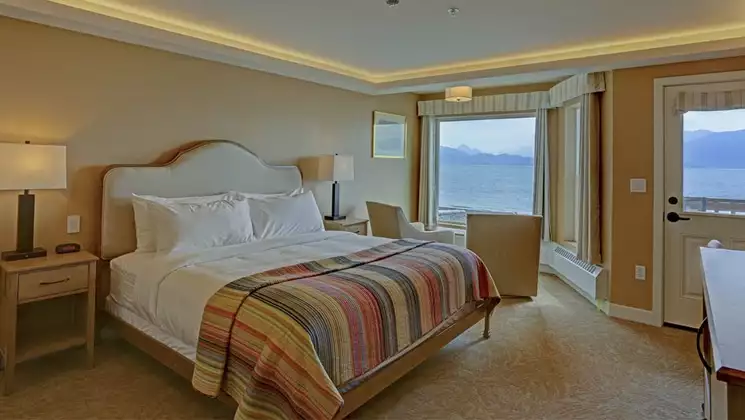 Stateroom with king bed at Land's End Resort