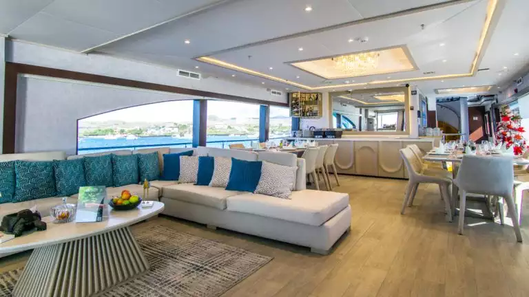 The lounge offers a comfortable location to catch up with the other guests while aboard the Grand Majestic in the Galapagos