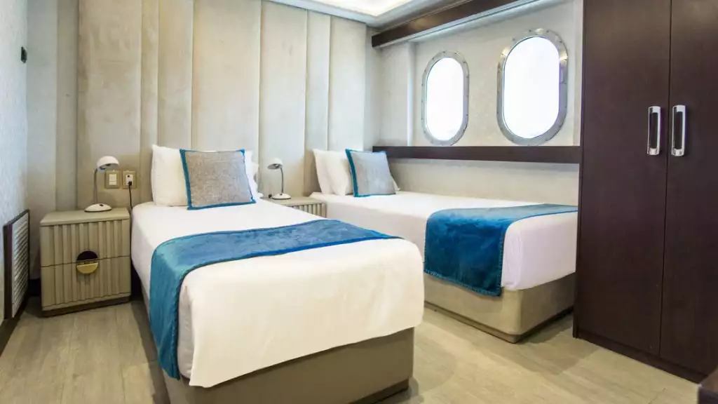 Stateroom #5 with twin beds aboard Grand Majestic