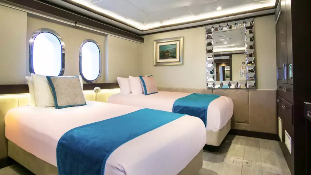 Stateroom #6 with twin beds aboard Grand Majestic