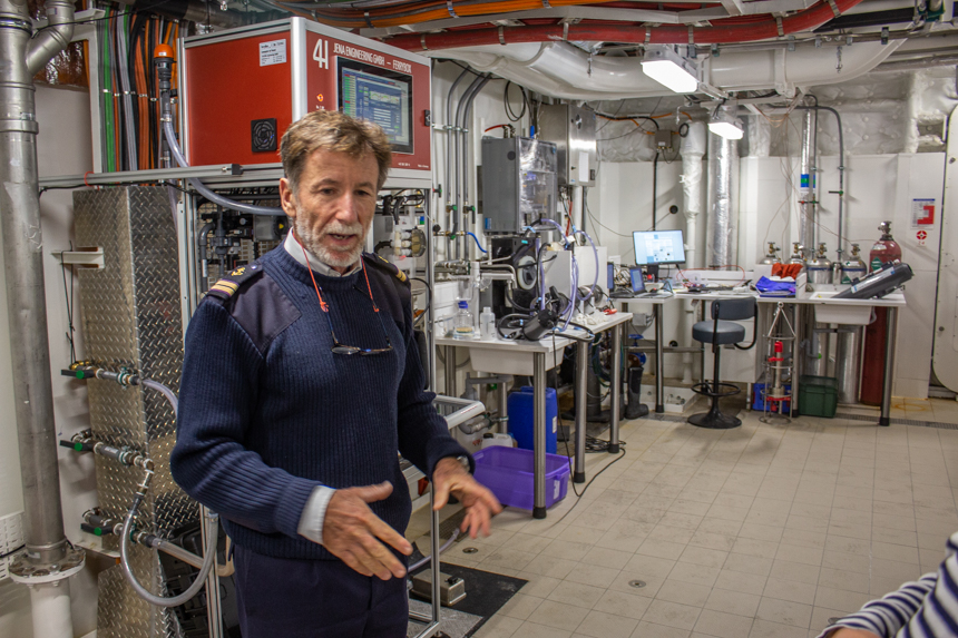 Science officer giving tour of wet and dry science labs aboard Le Commandant Charcot ship