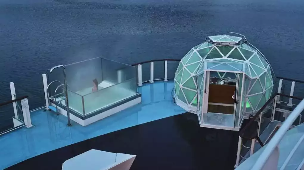 Aerial view of a luxury Antarctica cruise ship's hot tub and igloo room on the top deck